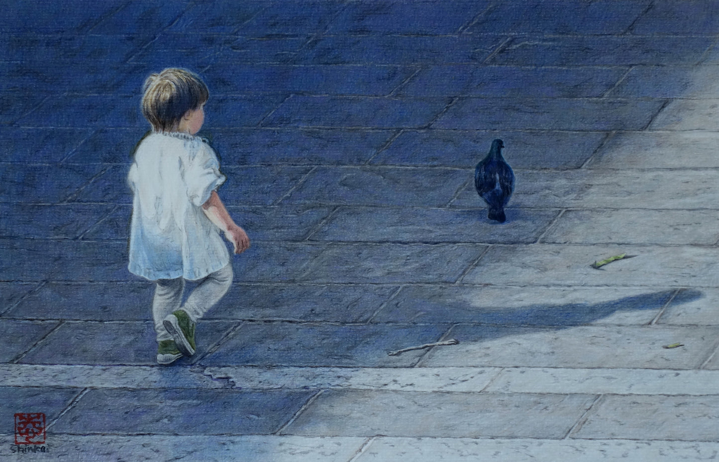 Bambino e piccione nella piazza delle Feste, Assisi